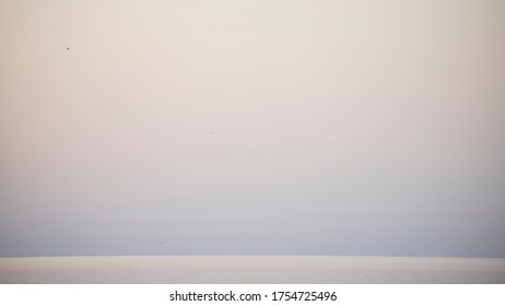The water surface extends far beyond the horizon