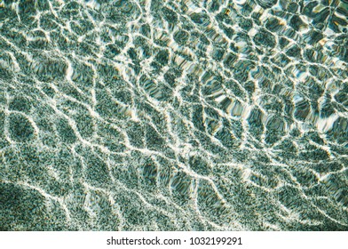 water surface in the pool background - Shutterstock ID 1032199291