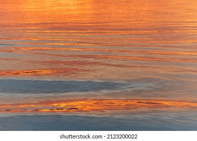 Water Surface Of The Rhine River Between Germany And France At Sunset. France.