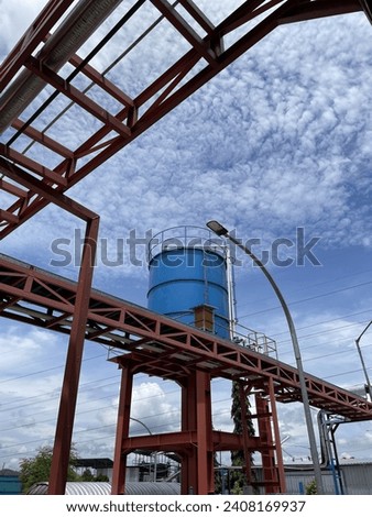 Water tank on factory and blue sky