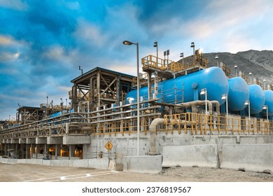 Water tanks and reverse osmosis equipment in a desalination plant.