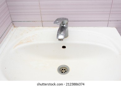 Water Tap With Dirty Sink Close Up. Chrome Faucet Wash Basin. Hygiene And Cleaning Hands Concept.