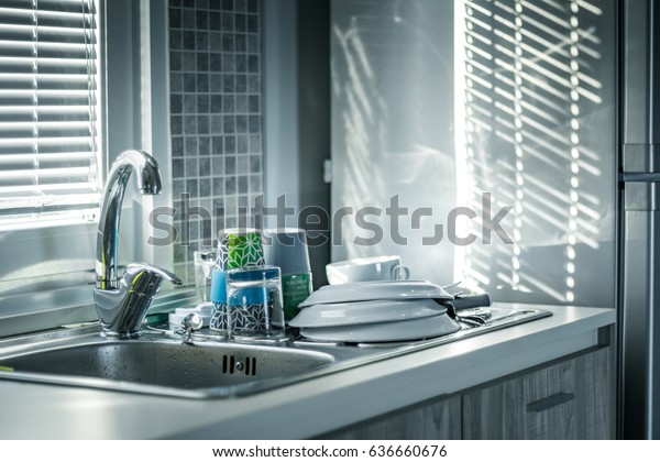 water tap,\
dish wash dishes, plate, sunny\
morning