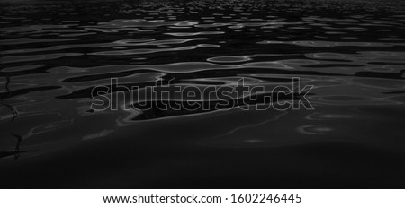 water texture. water reflection texture background. Dark background, High resolution background of dark water or oil surface. Ocean surface dark nature background. River lake rippling Water. 