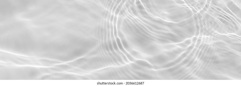 Water texture with sun reflections on the water overlay effect for photo or mockup. Organic light gray drop shadow caustic effect with wave refraction of light. Long banner with empty space.