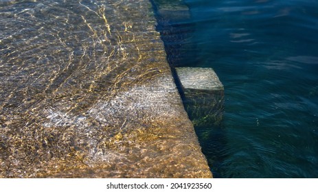 Water textures for backgrounds with ripples and movement created where the river meets the sea