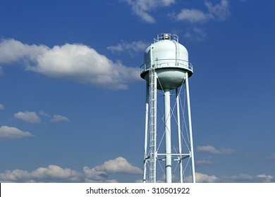 Water Tower Against Blue Sky.