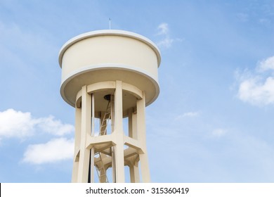 Water Tower With  Blue Sky