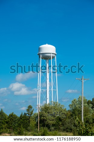 Water tower outside of a small american town