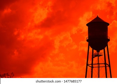 Water Tower Silhouette And Red Sky