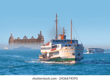 Water trail foaming behind a passenger ferry boat in Bosphorus -Haydarpasa (Haydarpaşa) Train Station in Istanbul City, Turkey    - Powered by Shutterstock