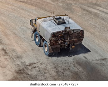Water transport and dumping process using huge water tankers on mining roads