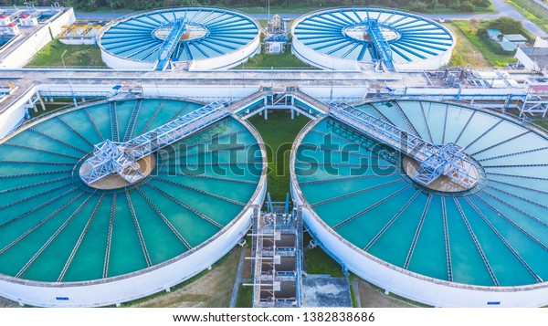 Water\
treatment solution, Industrial water treatment‎, Aerial top view\
recirculation solid contact clarifier sedimentation tank, Ecosystem\
and healthy environment concepts and\
background.