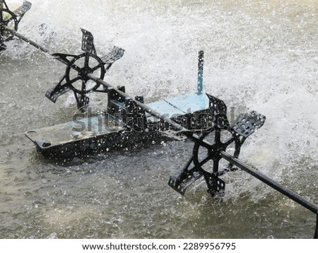water turbine, Water wheel increasing oxygen in the water, spinning and splashing water