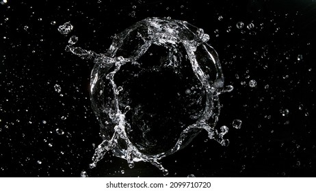 Water Vortex Isolated On Black Background, Macro Shot.