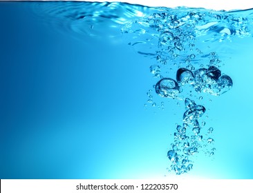 Water wave with bubbles. - Powered by Shutterstock