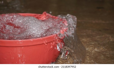 Water Wave On Red Water Tank. Drop Water