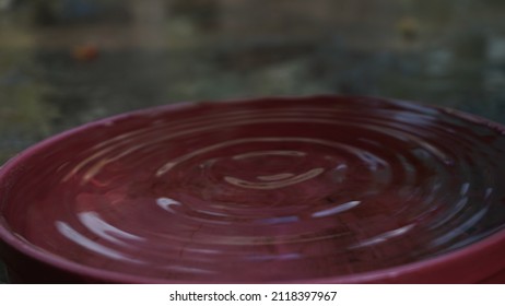 Water Wave On Red Water Tank. Drop Water