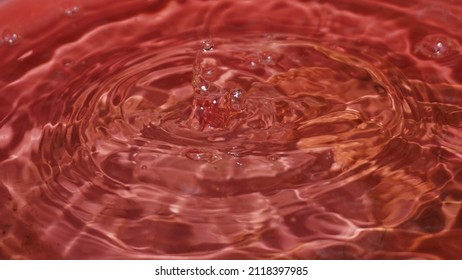 Water Wave On Red Water Tank. Drop Water