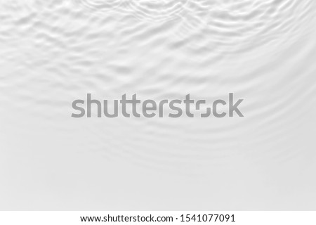 Water waves on the pool. Abstract background. Black and white concept.