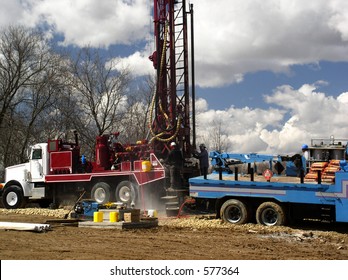 Water well is drilled by workmen
