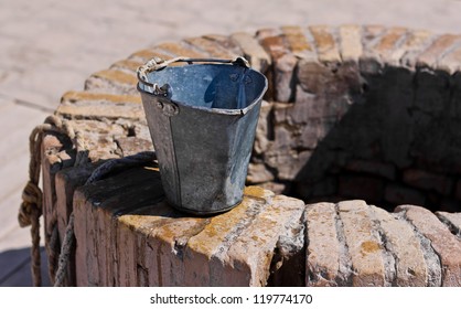 A water well with an old bucket in Samarkand, Uzbekistan