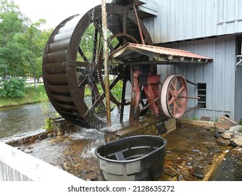 Water wheel at Saunooke Mill, a working stone ground mill beside the Oconaluftee River in Cherokee, North Carolina.
