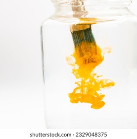 Watercolor brushes in a glass jar - Powered by Shutterstock