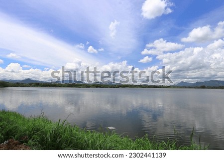 Watercolor Landscape with Mountain Lake. Mountain panorama with lake, forest and blue sky. Mountain panorama in forest.