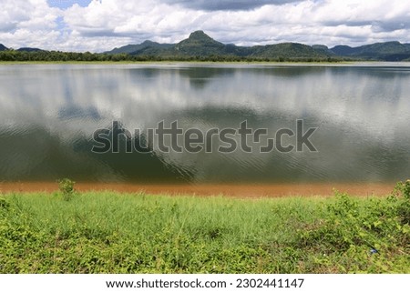 Watercolor Landscape with Mountain Lake. Mountain panorama with lake, forest and blue sky. Mountain panorama in forest.
