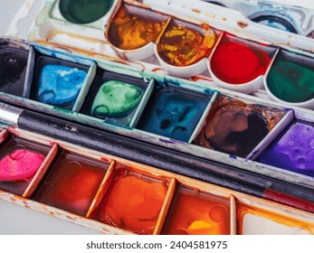 Watercolor paints for drawing and painting water paints for artists fine arts teaching children's creativity close-up - Powered by Shutterstock