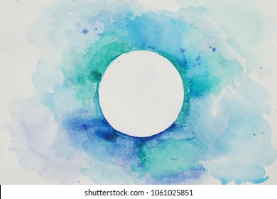 Watercolor Stylized Circle in Blue Colors on a White Textured Background. Watercolor.