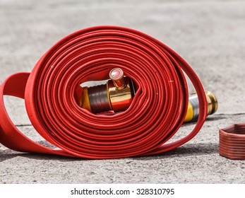 Watercourse fire extinguisher red ready to use in the outdoor.