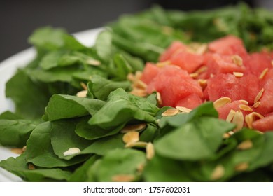 watercress salad with salmon and almond flakes - Powered by Shutterstock