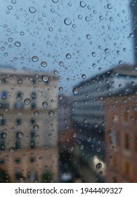 Waterdrope Over The Window After Rain By Night.