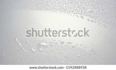 Waterdrops on clean glass surface
