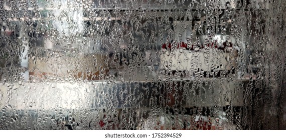 Waterdrops the showcase glass in cake shop for low temperature refrigeration  Colorful   blur background  Abstract  Moisture the clean glass 