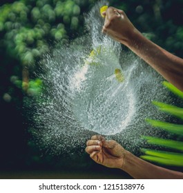 Watered  Ballon Burst, A Ballon Was Filled Up With Water And Burst To Capture The Way Water Splashes. 