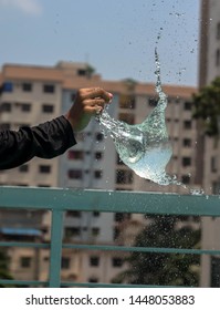 Watered Ballon Burst,A Ballon Was Filled Up With Water And Burst To Capture The Way Water Splashes