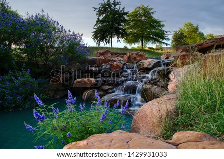 A waterfall in a beautiful Frisco, TX park.