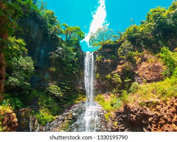 waterfall between cliffs