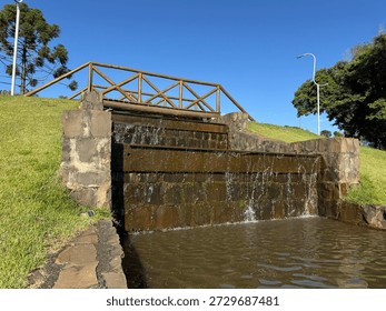 Waterfall cascading into a river
