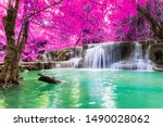 Waterfall colorful leaves in the summer is a beautiful waterfall with clear, flowing water, soft, emerald green color, suitable for relaxing, playing,