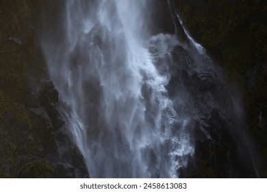 Waterfall coming down on the mossy rocks - Powered by Shutterstock