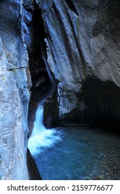 A Waterfall Deep Inside The Box Canyon Of Ouray, Colorado, USA