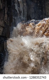 Waterfall With Dirty Water; High Force Is One Of The Biggest Waterfalls In England And Is Popular By Tourists. High Force Is Located Near Middleton-in-Teesdale In The North Pennines, England. 