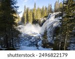 Waterfall during spring floods in Puolanka, Finland