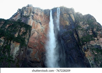 Waterfall falling from a rock wall