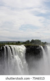 Waterfall flowing down cliffs