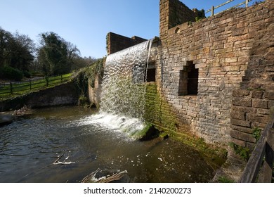 Waterfall flowing into a pond scene